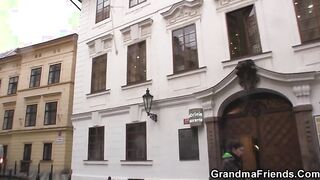 Hairy granma in red lingerie swallows two dicks