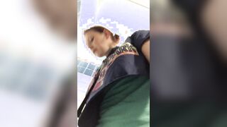 Unleashing a massive piss at Denver Airport where I forgot Id taken my clit bar out whilst wiping my very hairy pussy